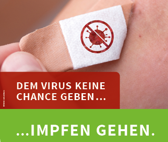 Bild vergr&ouml;&szlig;ern: Das Bild zeigt ein Pflaster auf einem Arm mit dem Corona-Virus.